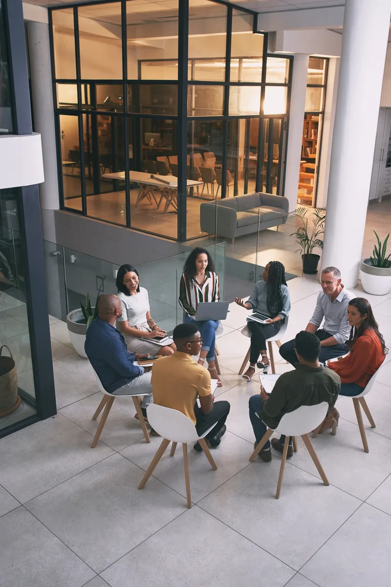 A group coaching circle in discussion